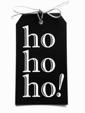 ho ho ho! gift tags with white foil on black linen paper with metallic silver tie. 3x5"