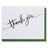 Thank you card. Black foil embossed on bright white paper with a metallic green or metallic red envelope.