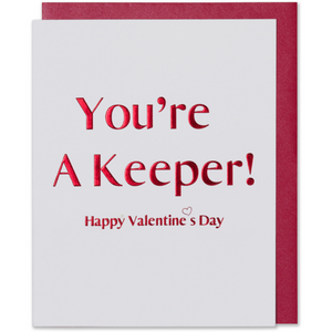 You're A Keeper Happy Valentine's Day Card Red Foil Embossed on bright white paper with a small outlined heart in red foil and a red metallic envelope